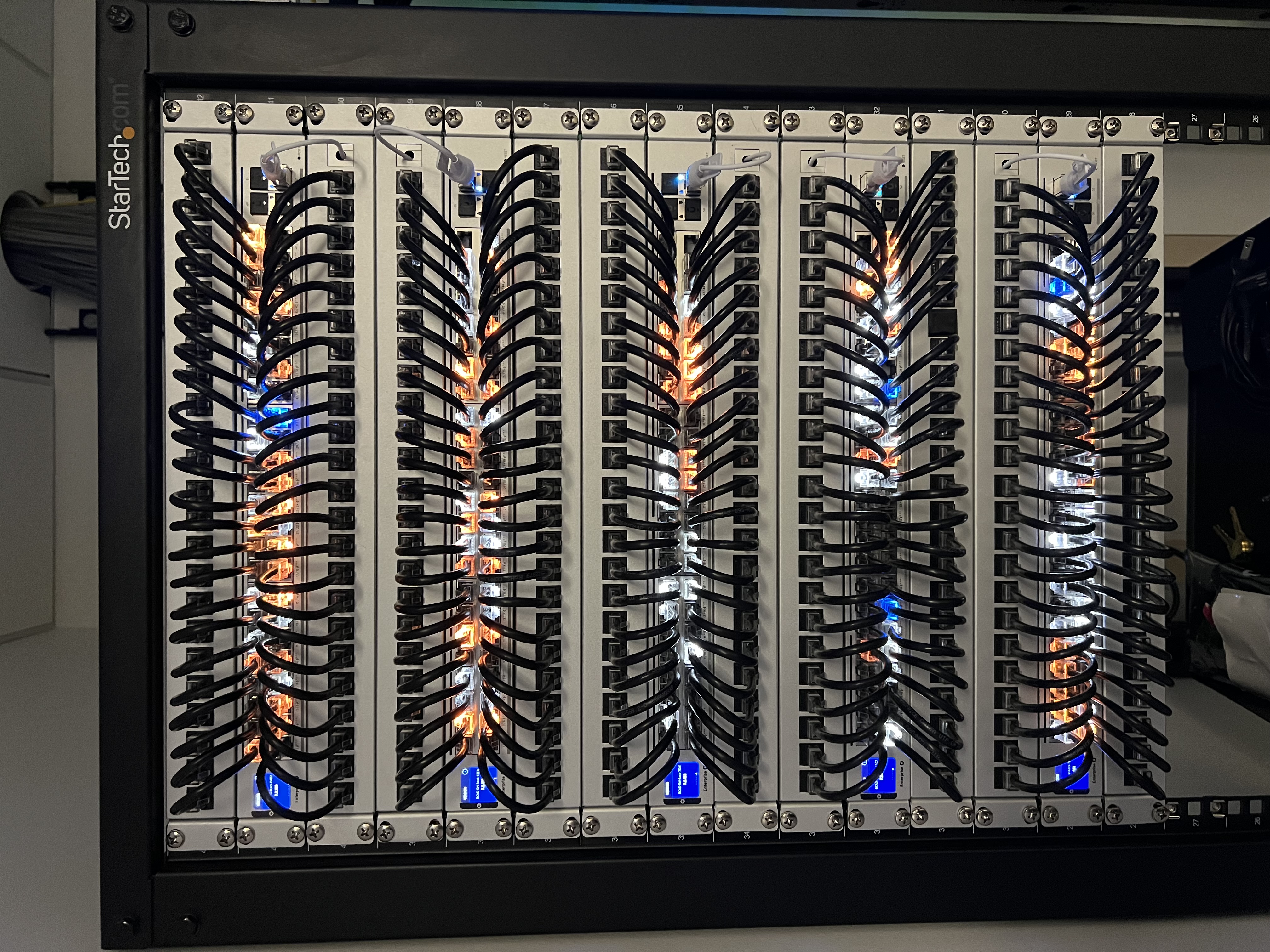 Four-post network rack installation